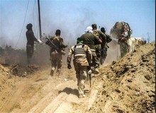 نیروهای الحشد الشعبی حمله عناصر داعش در مرز سوریه و عراق را دفع کردند