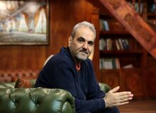 عکس | کنایه خیابانی به فوتبالی‌ها در دیدار با علیرضا دبیر؛ برعکس کشتی فقط می‌بازند!