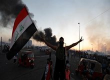 ۳۰کشته و ۱۸۰۰زخمی در تظاهرات عراق/بغداد و کربلا امنیتی شد/دفاتر حشد الشعبی آتش گرفت/ مقررات منع آمد و رفت در کربلا